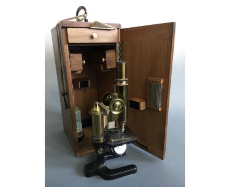 A Seibert in Wetzlar 15119 microscope in fitted box with micro slides. IMPORTANT: Online viewing and bidding only. Collection