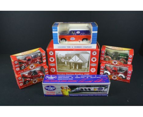 Four boxed diecast Texaco Old Timer Collection 1940 Ford models, a boxed Cooper Tires Freightliner C120 Tractor/Trailer &amp;