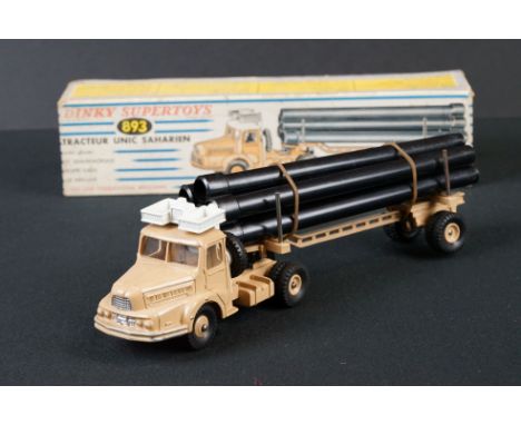 Boxed French Dinky Supertoys 893 Tracteur Unic Saharien diecast model complete with 6 x pipes, diecast vg condition, box gd w