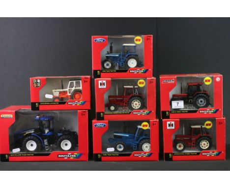 Seven boxed Britains 1:32 diecast model tractors to include 43193 New Holland T9 530, 42841 Ford TW30, 42491 Case IH 1056XL, 