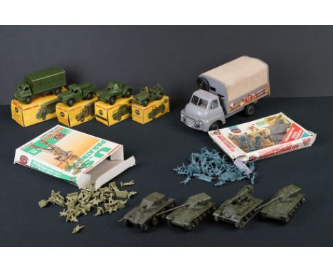 Four boxed Dinky military diecast models to include 621 3 Ton Army Wagon, 641 Army 1 Ton Cargo Truck, 670 Armoured Car and 67