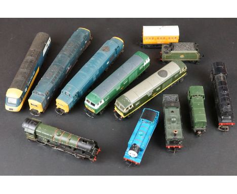 10 OO gauge locomotives to include Hornby D7054, Mainline Royal Scot, Hornby Thomas the Tank Engine plus Clarabel carriage, L