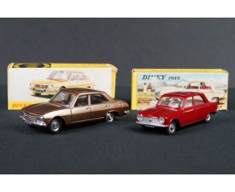 Two boxed Dinky diecast models to include Spanish Peugeot 504 in bronze and French 510 Peugeot 204 in red, diecast vg, boxes 