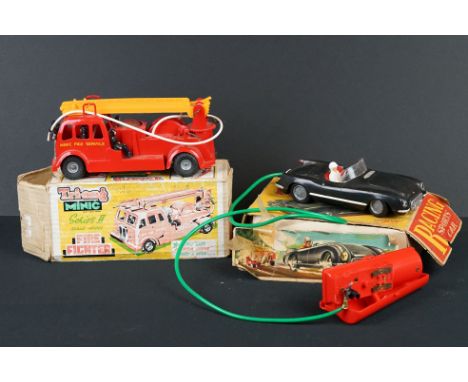 Two boxed plastic models to include Triang Minic Series II Fire Fighter 'Inertia Drive' and Clifford Series electrically oper