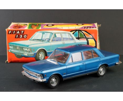 Boxed Pocher Torino N 29 Fiat 130 tin plate model in blue, shows some wear, mainly to roof but gd overall with gd box 