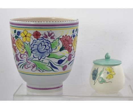 A MID 20TH CENTURY POOLE POTTERY VASE having hand painted stylised floral decoration, 18.5cm high, together with a POOLE HAND