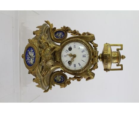 A LATE 19TH CENTURY FRENCH GOLD PAINTED CAST SPELTER MANTEL CLOCK, having 8-day mechanism Japy type with bell strike, faced b