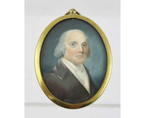 A GEORGE III OVAL MINIATURE PORTRAIT PAINTING of a gentleman, signed verso "E. Pugh" and dated 1796, 6cm x 4.5cm in an oval b