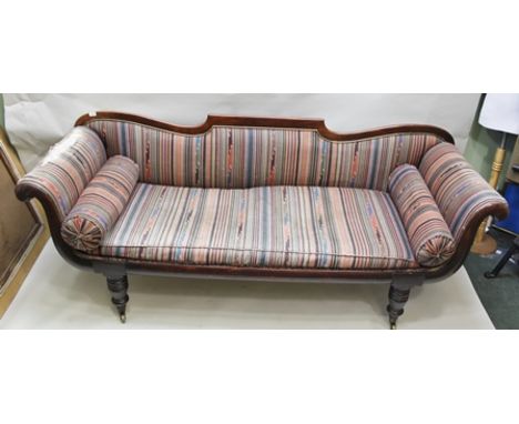 AN EARLY 19TH CENTURY REGENCY DESIGN MAHOGANY SCROLL END SOFA with shaped back, striped fabric upholstery with squab seat and