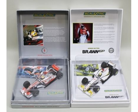 TWO SCALEXTRIC RACING CARS, Lewis Hamilton's McLaren Mercedes with Vodafone livery and Jensen Button's Brawn GP Virgin and ot