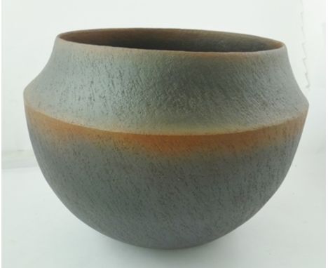 JOHN WARD (BRITISH b.1938) A studio pottery coil constructed bowl, bears seal stamp to base, 28cm high 