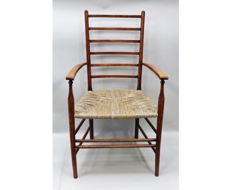 AN ARTS AND CRAFTS LADDER BACK OPEN ARMCHAIR with woven seagrass seat (by High Wycombe Chair Maker Co-operative 1863-1927) 