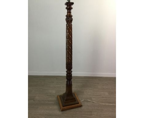 VICTORIAN MAHOGANY BEDPOST FLOOR LAMP, the spiral moulded column, on a square stepped base, with green and gilt shade, 185cm 