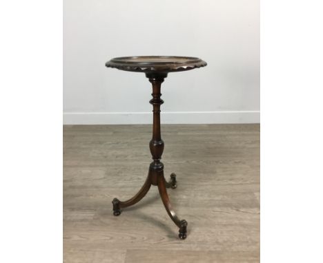 MAHOGANY CIRCULAR TRIPOD WINE TABLE, with turned vase shaped pillar, the splayed legs with bun feet, 30cm diameter Provenance