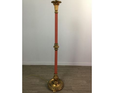 GILTWOOD AND CRIMSON PAINTED FLOOR LAMP, the cylindrical column on a dished circular base with bun feet, with a pleated fabri