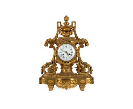 ATTRACTIVE 19TH CENTURY ORMOLU MANTEL CLOCK BY VINCENTI ET CIE the case with flaming urn cresting, white enamel dial below wi