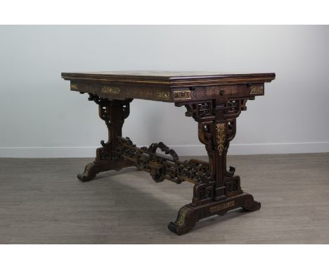 EARLY 20TH CENTURY CHINESE EXTENDING DINING TABLE, the rectangular top with incised key and floral designs and inset with mot