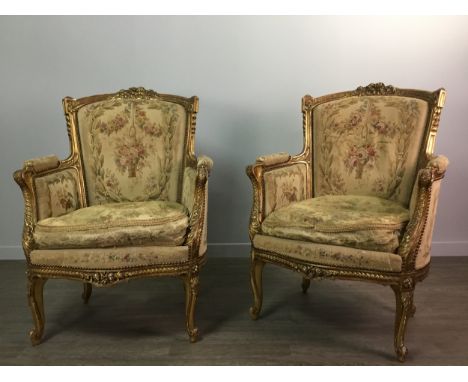 19TH CENTURY GILTWOOD FIVE PIECE SALON SUITE, the top rail with carved ribbon and floral cresting within guilloche borders, w