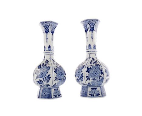 EARLY 20TH CENTURY DUTCH DELFTWARE BLUE &amp; WHITE VASE AND COVER, of baluster form, the cover with bird finial, the body de