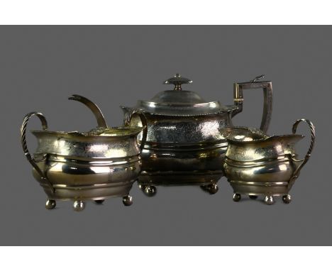 GEORGE III SILVER TEA SERVICE, maker George Fenwick, Edinburgh 1810, comprising teapot, sugar bowl and cream jug, each of sha