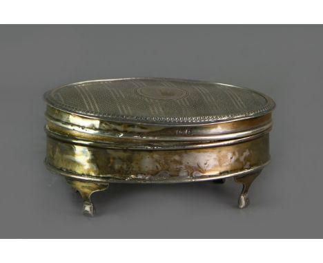 GEORGE V SILVER TRINKET BOX, maker Mappin &amp; Webb, Birmingham 1924, of oval form, the engine turned cover with blank centr