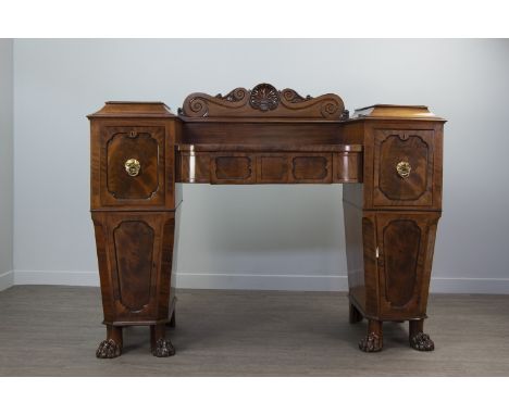 REGENCY MAHOGANY PEDESTAL SIDEBOARD, the raised back with moulded shell cresting, recessed shelf with moulded frieze drawer, 