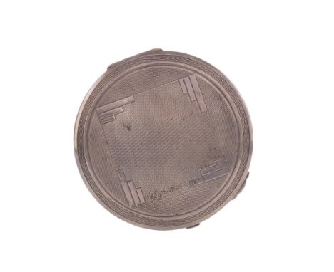 GEORGE V SILVER COMPACT, maker Crisford &amp; Norris, Birmingham 1933, of cicular form, with engine turned hinged cover, 8.5c