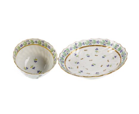 LATE 18TH CENTURY DERBY PORCELAIN TEAPOT, TEA BOWL &amp; SAUCER each wrythen body enamelled with floral sprigs within gilt bo