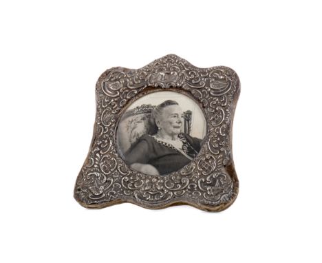 GEORGE VI SILVER PICTURE FRAME, maker W. J. Myatt &amp; Co., Birmingham 1938, of shaped square form, embossed with scrolls an