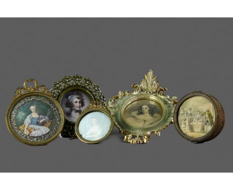 COLLECTION OF FOUR VICTORIAN AND LATER PICTURE FRAMES, each inset picture, the largest 23.5cm x 16cm, along with a brass trin