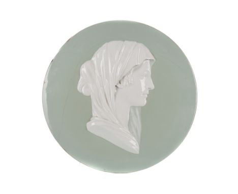 LATE 19TH CENTURY CERAMIC PORTRAIT ROUNDEL, modelled in relief as a bust length classical female wearing a veil, on a pale gr