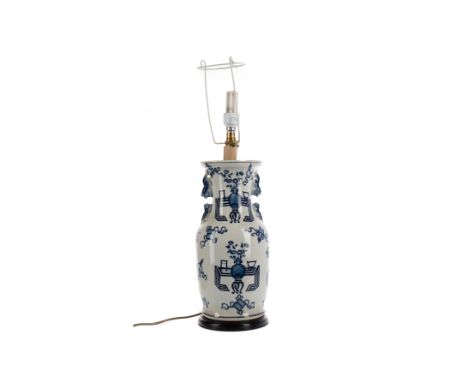 MID-20TH CENTURY CHINESE BLUE &amp; WHITE PORCELAIN TABLE LAMP, of baluster from with foo dog handles, decorated with vases o