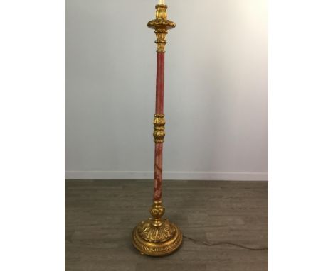 MOULDED GILTWOOD AND CRIMSON DAMASK FLOOR LAMP, the circular base with moulded acanthus leaf border, on bun feet, and with a 