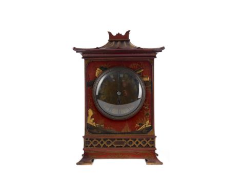 EDWARDIAN 'CHINESE CHIPPENDALE' MANTEL CLOCK, the circular brass dial with Roman numerals and one train 30 hour movement by J