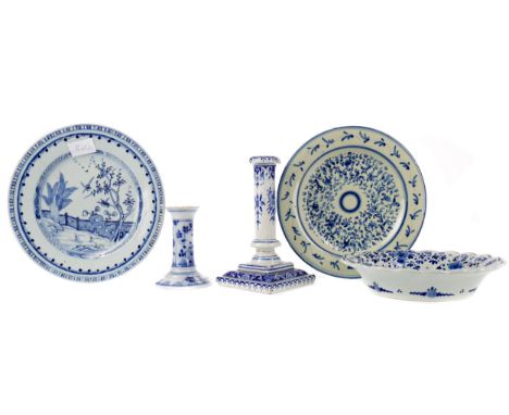EARLY 19TH CENTURY DUTCH DELFTWARE BLUE &amp; WHITE PORCELAIN PLATE, the central reserve hand-painted with a Chinoiserie land