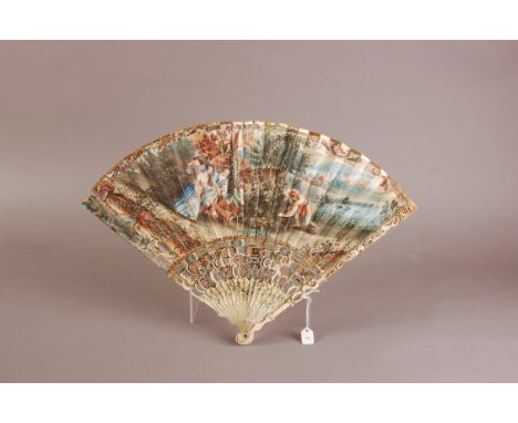 An 18th century carved ivory and paper leaf fan, 28cm, intricately carved and painted stick with spy holes, the well painted 