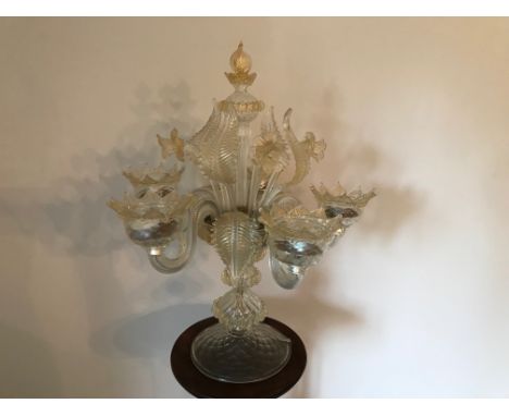 An early 20th century Italian glass lamp, approx 45cm high, no longer wired for electricity and used as a candelabra, the bas