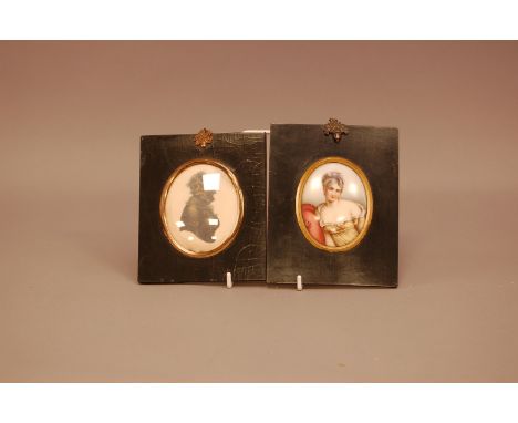 A porcelain portrait miniature,  depicting a Middle Aged Lady, together with a similar of a silhouette of an Elderly Lady (2)