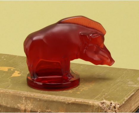 A Lalique red glass Sanglier" Car Mascot or Wild Boar,  on circular plinth, pattern no.1157, 8.5cm long, boxed