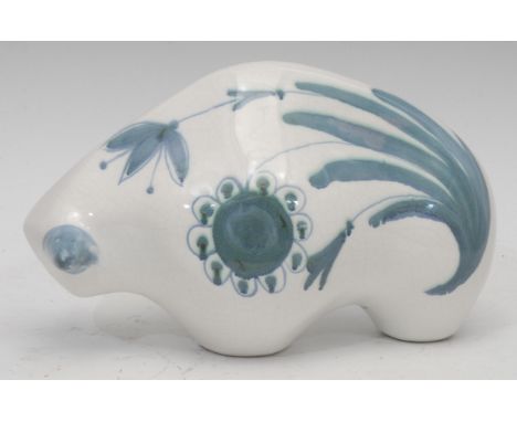 A Rye Pottery ceramic animal, a bison, by David Sharpe (English, contemporary), hand painted with lilies and sunflowers in to