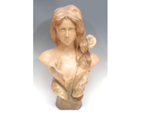 A large Art Nouveau Frederick Goldscheider terracotta bust, of a young woman with lilies, after Fortunato Gori, painted in mu