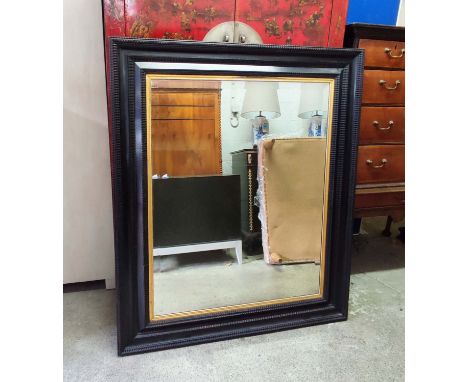 WALL MIRROR, 115cm x 140cm, black frame with gilt detail beveled plate. 