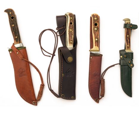 A COLLECTION OF FOUR OUT OF PRODUCTION PUMA SHEATH-KNIVES, including a boxed model 116393 'Handmade Skinner' (excellent, box 