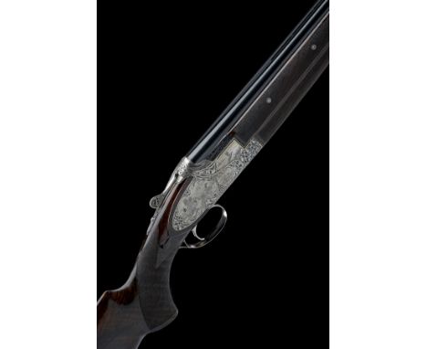 FABRIQUE NATIONALE A CUSTOM DUBOIS-ENGRAVED 12-BORE SINGLE-TRIGGER SIDEPLATED OVER AND UNDER EJECTOR, serial no. 025748K3PM, 