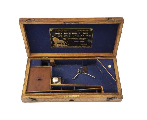 A GOOD VINTAGE OAK REVOLVER CASE ALMOST CERTAINLY FOR A W.G. WEBLEY WITH JOHN DICKSON TRADE LABEL, circa 1930, with ten-screw