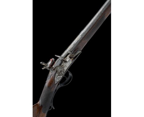 A MOST IMPRESSIVE 22-BORE SPANISH SPORTING-GUN WITH SILVER AND GILT DAMASCENED BARREL AND MADRID MIQUELET LOCK SIGNED JOSEPH 