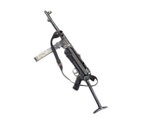 A DEACTIVATED 'MP40' SUBMACHINE GUN MARKED 'FXO 41', serial no. 91921, made in 1941 by C.G. Haenal, Suhl, with folding stock,