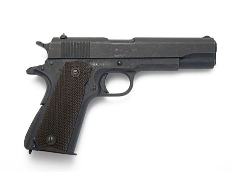 A GOOD .45 (ACP) COLT 1911A1 GOVERNMENT SEMI-AUTOMATIC SERVICE PISTOL, serial no. 915733, for 1943, with 5in. barrel, darkly 