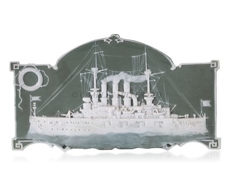 A RARE IMPERIAL GERMAN PORCELAIN PLAQUE DEPICTING THE ARMOURED CRUISER PRINZ ADALBERT, 1900 the moulded biscuitware plaque in