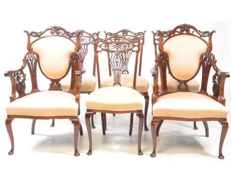 A collection of six Edwardian Chippendale style mahogany dining chairs complete with two carvers. Mahogany construction with 